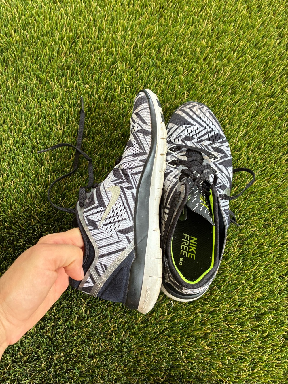 Nike Black and White Geometric Running Sneakers with Neon Green Insole